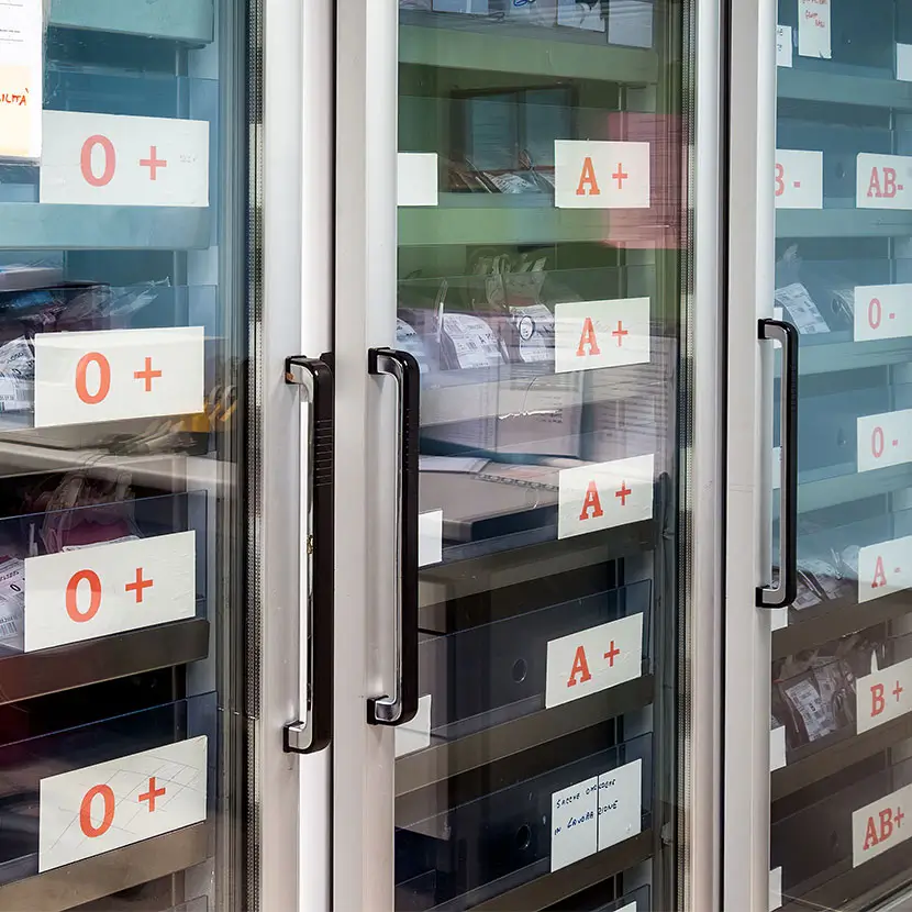 Blood and tissue bank refrigerated storage units with labeled blood bags for secure monitoring