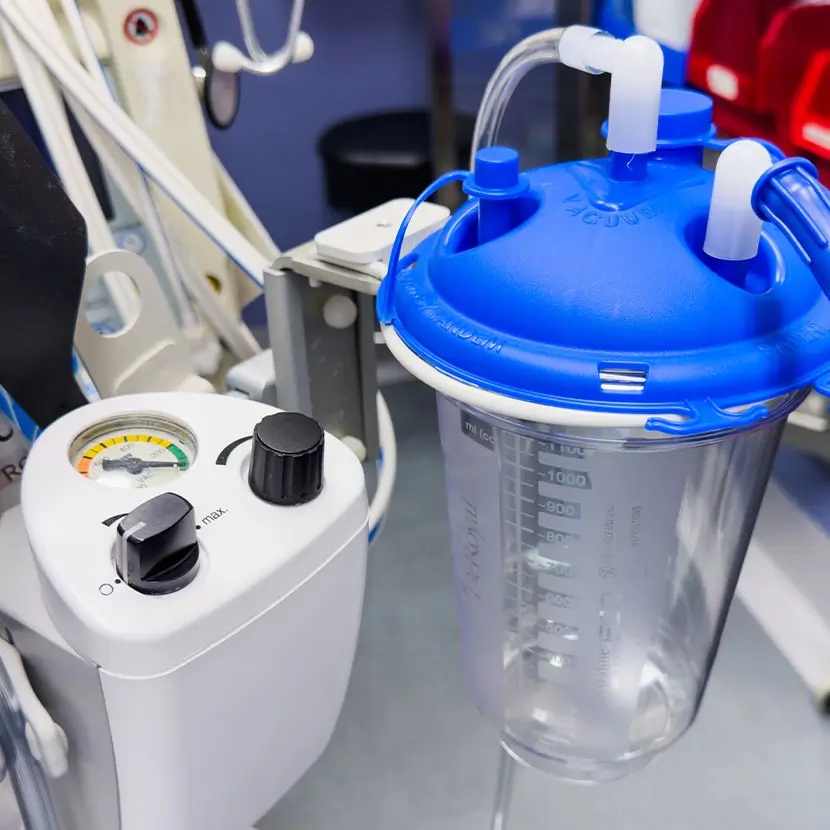 Medical and dental vacuum suction device with tubing and collection canister for patient care